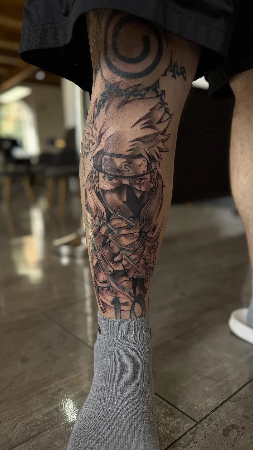 Kakashi Anime Tattoo am Bein